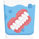 Teeth cleaning icon showing healthy teeth in water