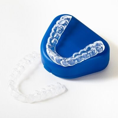 Clear dental aligner and retainer for teeth straightening treatment in Indore